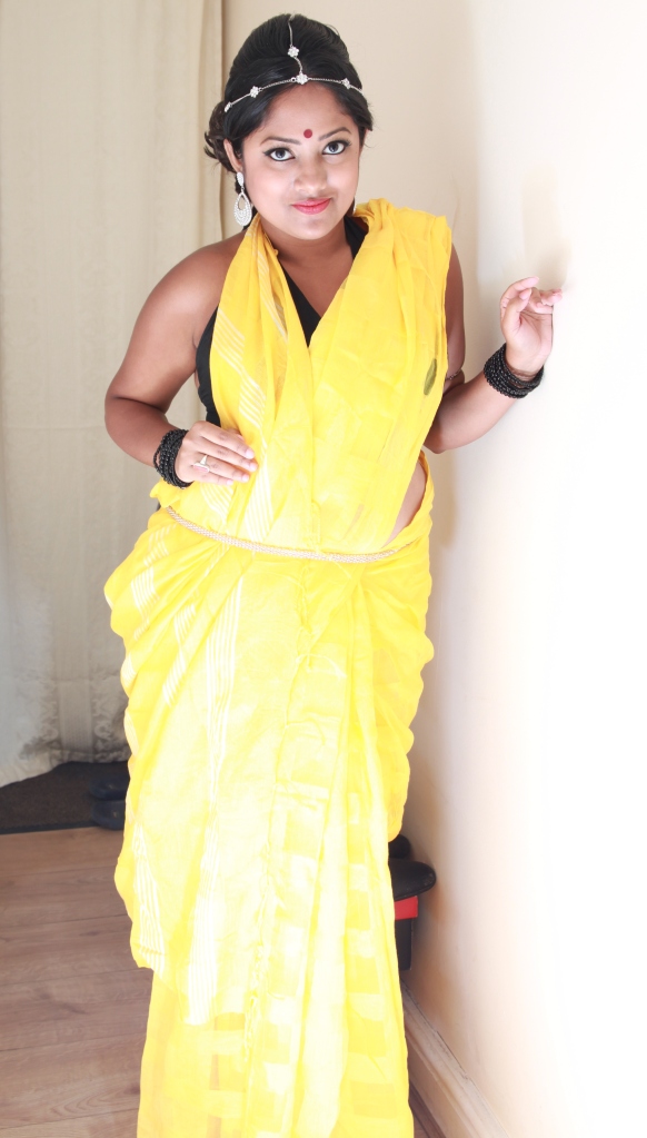 Day look- Yellow sari draped in a different style