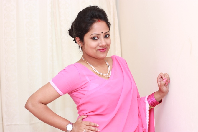 Day look- pink chiffon sari worn with a normal blouse